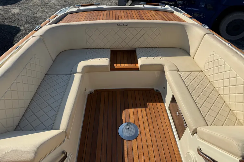 Slide: The Image of Luxurious interior of 2018 Chris-Craft Launch 30 with elegant seating and teak flooring. - 7