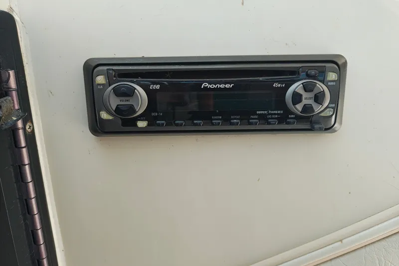 Slide: The Image of Pioneer car stereo installed in a 1996 SportsCraft 232HT boat dashboard. - 33