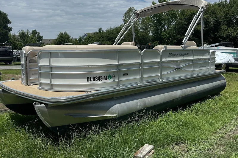Slide: The Image of 2018 Berkshire 22RFC CTS pontoon boat on grassy area under cloudy sky. - 3