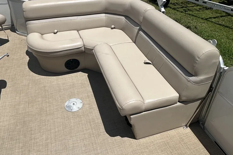 Slide: The Image of Beige seating area on a 2018 Berkshire 22RFC CTS boat deck. - 7