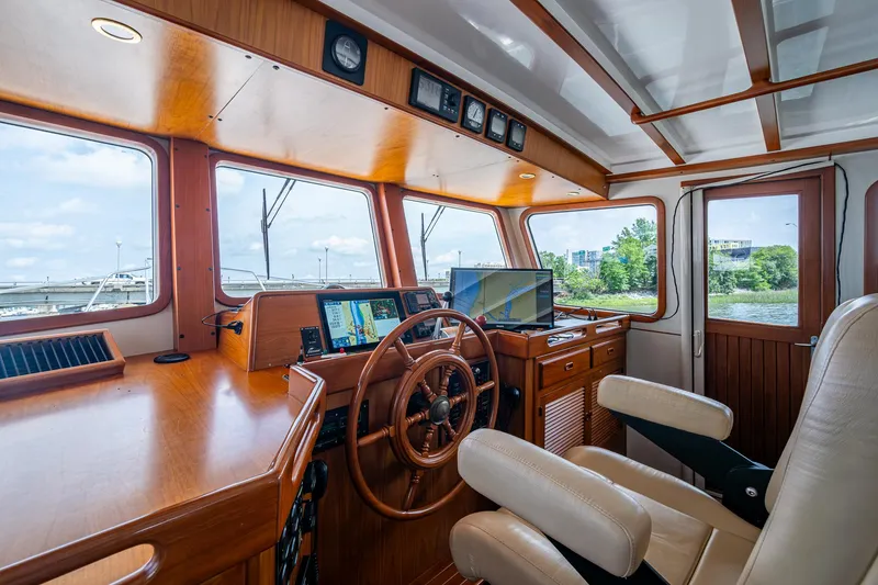 Slide: The Image of Pilothouse interior of 2000 Kadey-Krogen 48 North Sea yacht with navigation equipment. - 30