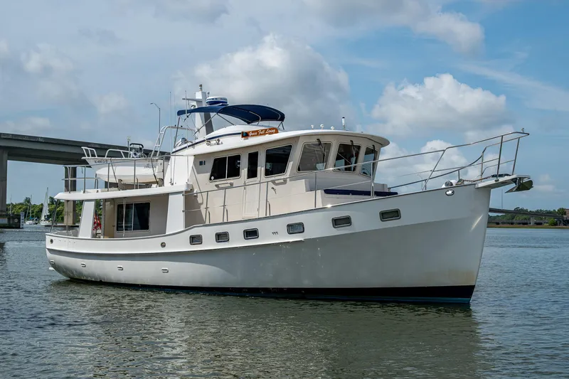 The Image of Kadey-Krogen 48 North Sea yacht, 2000 model, cruising on calm waters under a cloudy sky. - 0