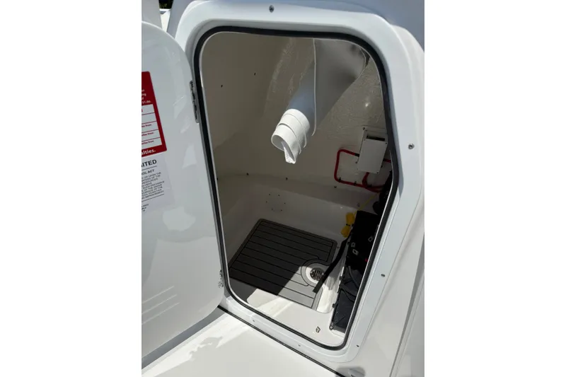 Slide: The Image of Interior view of 2027 Tidewater 220 CC Adventure boat storage compartment. - 10