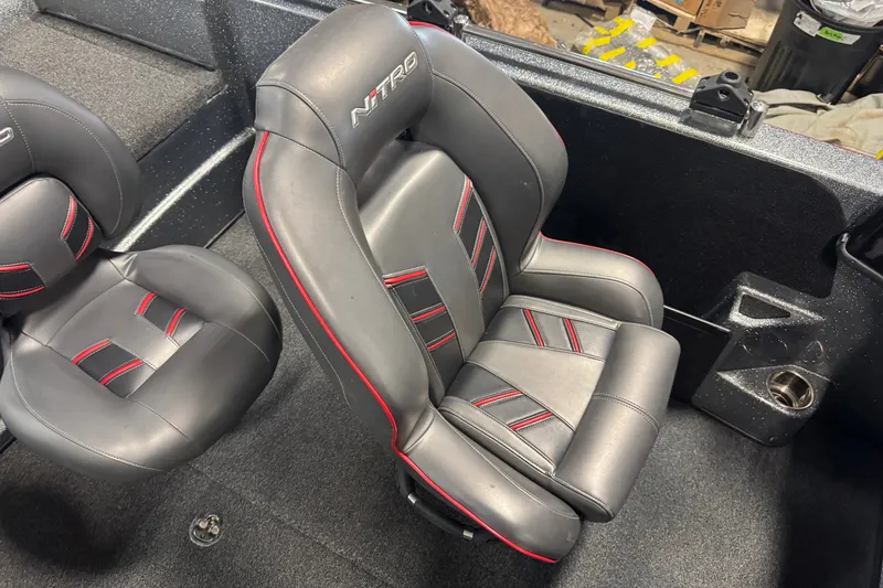 Slide: The Image of 2019 Nitro ZV19 boat seats with black and red accents, showcasing premium design. - 8