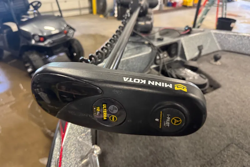 Slide: The Image of Minn Kota Ulterra trolling motor on a 2019 Nitro ZV19 boat in a garage. - 15