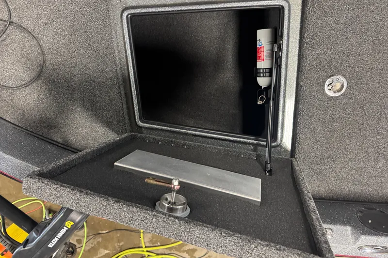Slide: The Image of Storage compartment of a 2019 Nitro ZV19 boat with equipment and accessories. - 16
