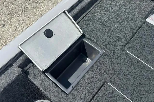 Slide: The Image of Open storage compartment on 2026 Tracker Pro Team 175 Crappie Edition boat. - 19