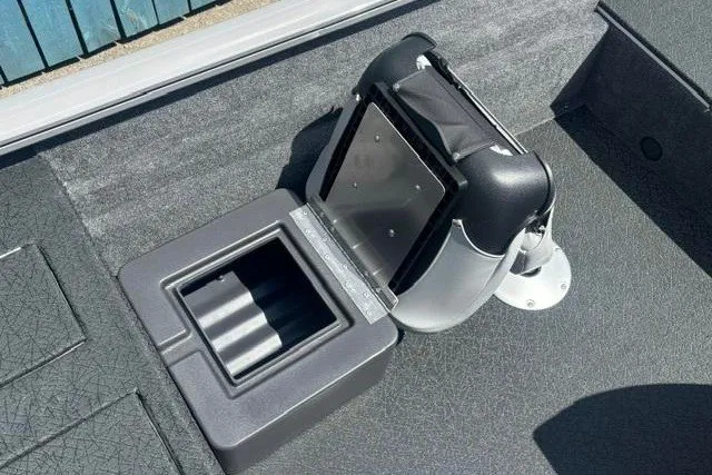 Slide: The Image of 2026 Tracker Pro Team 175 Crappie Edition boat seat and storage compartment. - 17