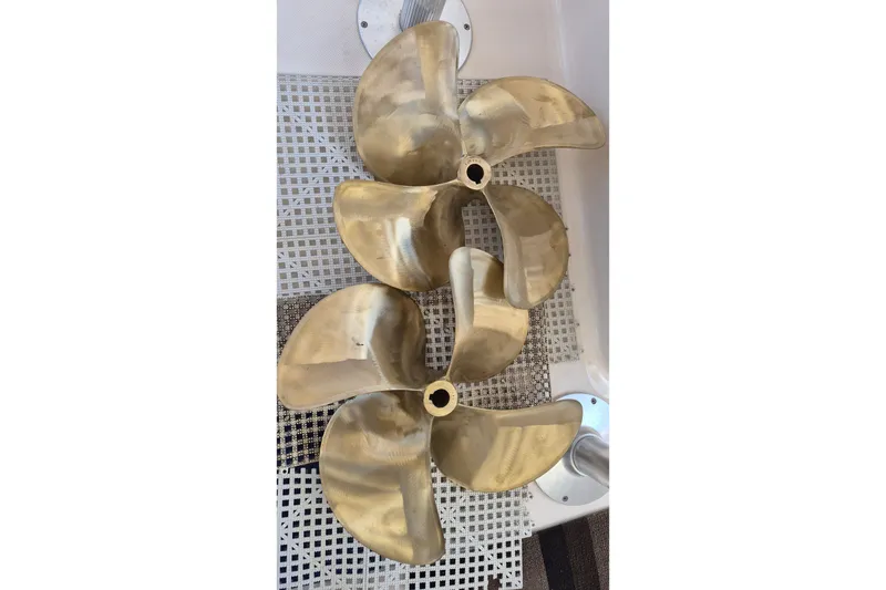 Slide: The Image of Propellers of a 2005 Endeavour 44 TrawlerCat, displayed on a textured surface. - 82
