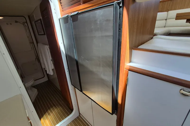 Slide: The Image of Interior of 2005 Endeavour 44 TrawlerCat showing bathroom and kitchen area. - 44