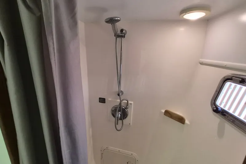 Slide: The Image of Bathroom shower area in a 2005 Endeavour 44 TrawlerCat yacht. - 32