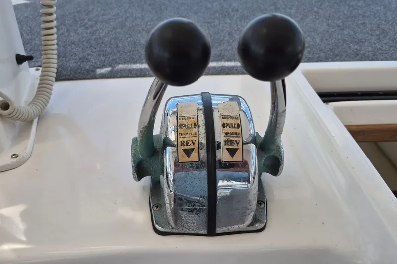 Slide: The Image of Throttle controls on a 2005 Endeavour 44 TrawlerCat boat. - 16