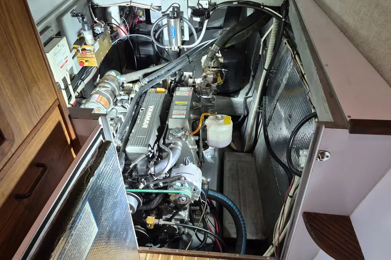 Slide: The Image of Engine room of a 2005 Endeavour 44 TrawlerCat with Yanmar engine components. - 52