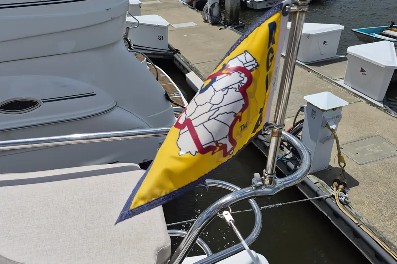 Slide: The Image of Yellow flag on Endeavour 44 TrawlerCat, docked at marina, 2005 model. - 69