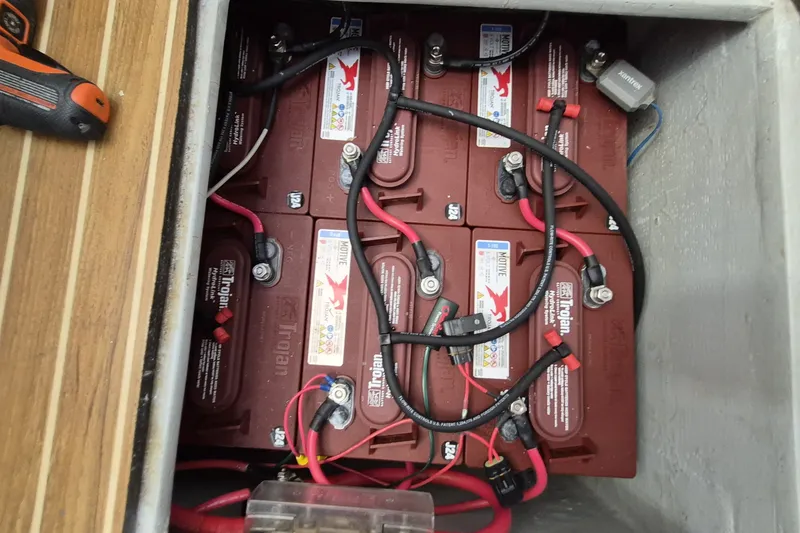 Slide: The Image of Battery compartment of a 2005 Endeavour 44 TrawlerCat with Trojan batteries and wiring. - 79