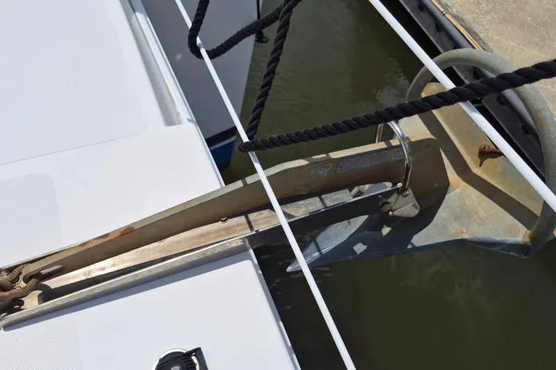 Slide: The Image of Anchor detail on 2005 Endeavour 44 TrawlerCat, docked with ropes visible. - 72