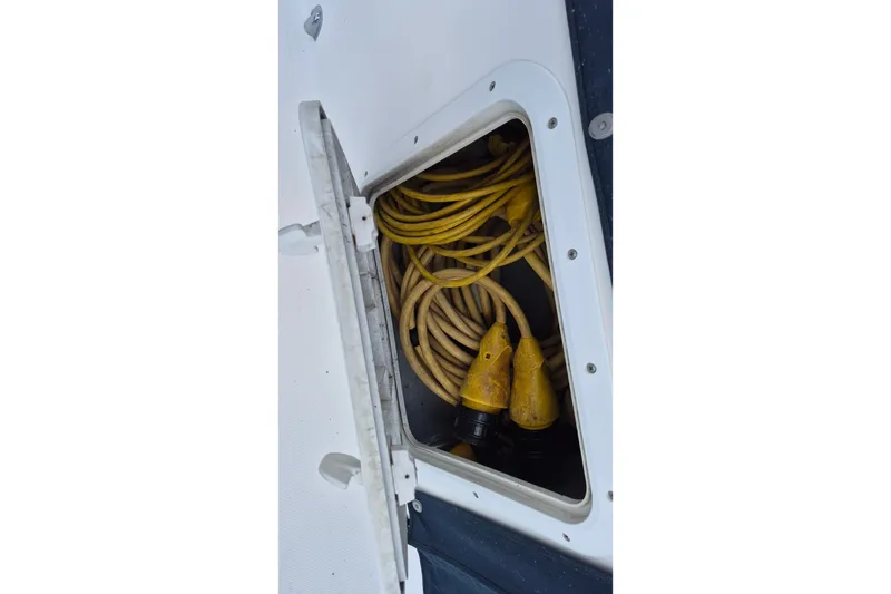 Slide: The Image of Storage compartment with yellow cables on 2005 Endeavour 44 TrawlerCat. - 66