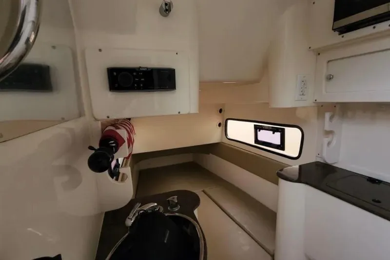 Slide: The Image of 2017 Scout 350 LXF cabin interior with modern amenities and sleek design. - 71