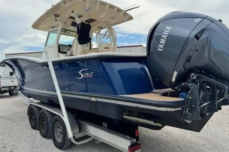 Slide: The Image of 2017 Scout 350 LXF boat on trailer with Yamaha outboard engine. - 49
