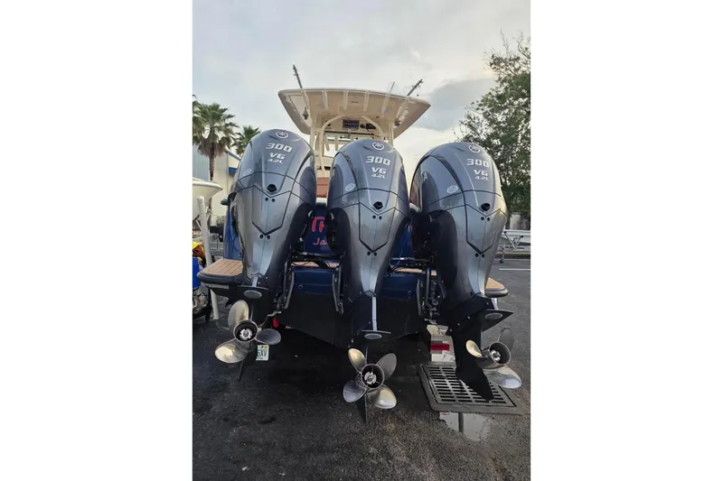 Slide: The Image of 2017 Scout 350 LXF boat with triple Yamaha 300 V6 outboard engines. - 81