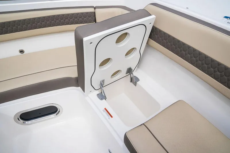 Slide: The Image of Manufacturer Provided Image: 2025 Pursuit DC 365 Dual Console boat seating with storage compartment open. - 8
