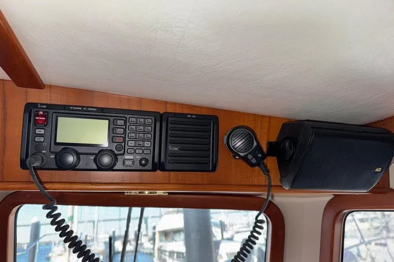 Slide: The Image of 2008 Kadey-Krogen 44 Walk Around boat radio and speaker system in cabin. - 68