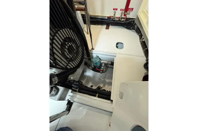 Slide: The Image of Engine room of 2008 Kadey-Krogen 44 Walk Around yacht, showcasing mechanical components. - 49
