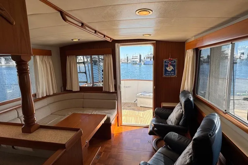 Slide: The Image of Interior of 2008 Kadey-Krogen 44 Walk Around yacht with comfortable seating and waterfront view. - 32