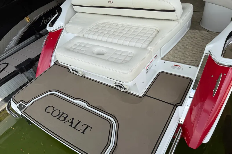 Slide: The Image of 2019 Cobalt R5 boat with white seating and branded swim platform. - 32