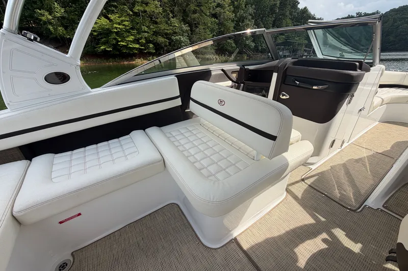 Slide: The Image of 2019 Cobalt R5 boat interior with white seating and sleek design. - 21