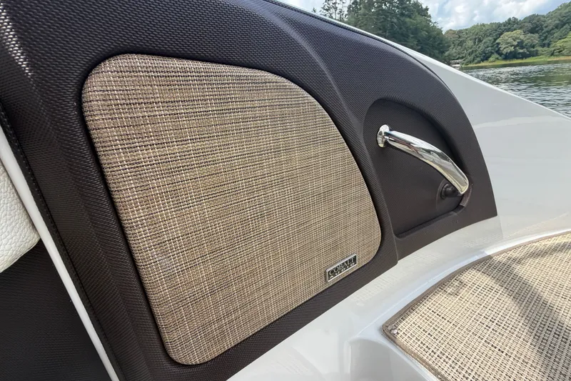 Slide: The Image of 2019 Cobalt R5 boat interior with textured panel and chrome handle. - 20