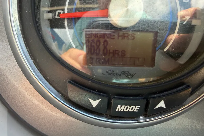Slide: The Image of Close-up of 2016 Sea Ray 290 Sundeck Outboard engine hour meter displaying 168.8 hours. - 9
