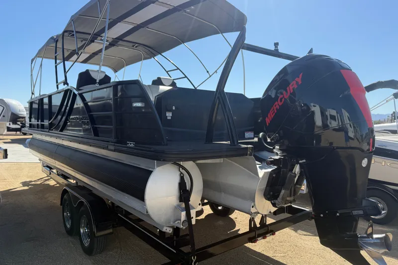 Slide: The Image of 2017 South Bay 500 Sport pontoon boat with Mercury outboard motor on trailer. - 4