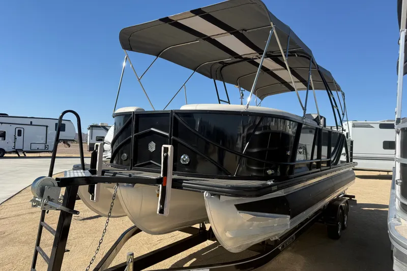 Slide: The Image of 2017 South Bay 500 Sport pontoon boat on trailer, parked outdoors. - 3