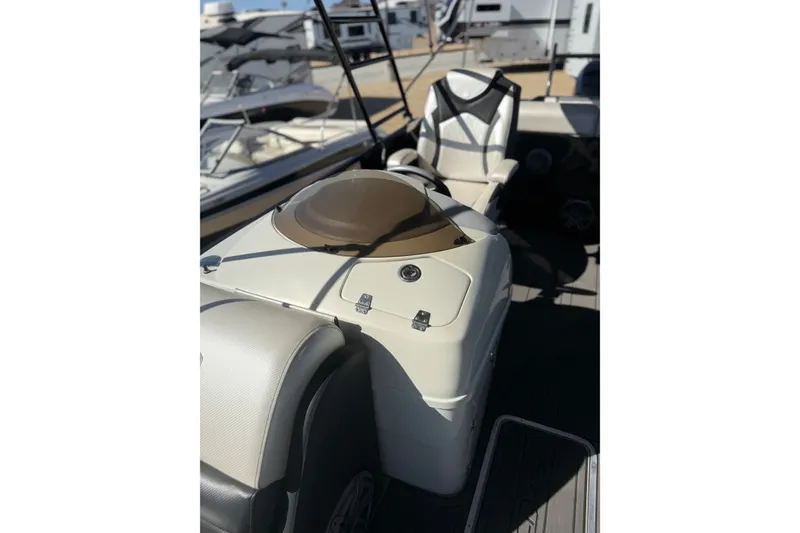 Slide: The Image of 2017 South Bay 500 Sport boat interior with steering console and seating. - 10