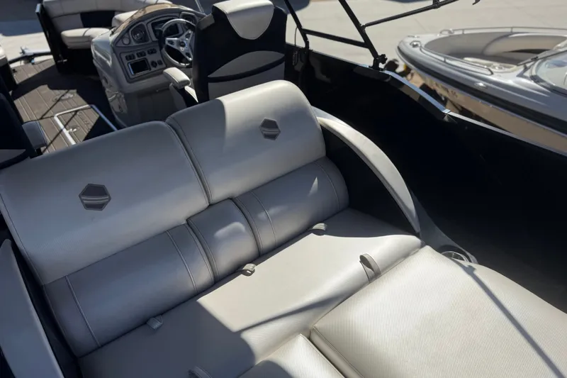 Slide: The Image of 2017 South Bay 500 Sport boat interior with luxurious seating and modern dashboard. - 17