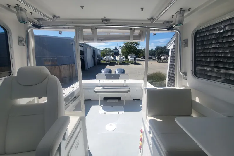 Slide: The Image of Interior view of 2020 Steiger Craft 28 Miami boat, featuring seating and open deck area. - 23