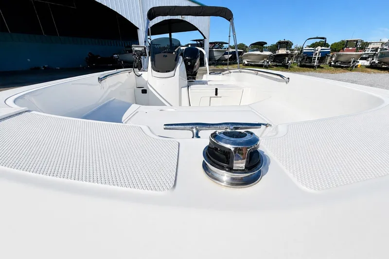 Slide: The Image of 2019 Boston Whaler 160 Super Sport boat interior with steering console and seating. - 18