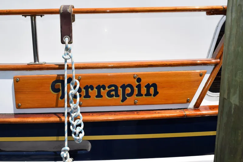 Slide: The Image of Wooden nameplate "Terrapin" on 1980 Cheoy Lee 52 Motorsailer boat. - 14