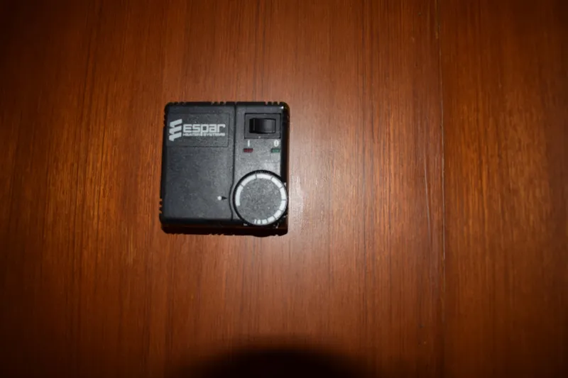 Slide: The Image of Espar heater control on wooden surface, Cheoy Lee 52 Motorsailer, 1980 model. - 70