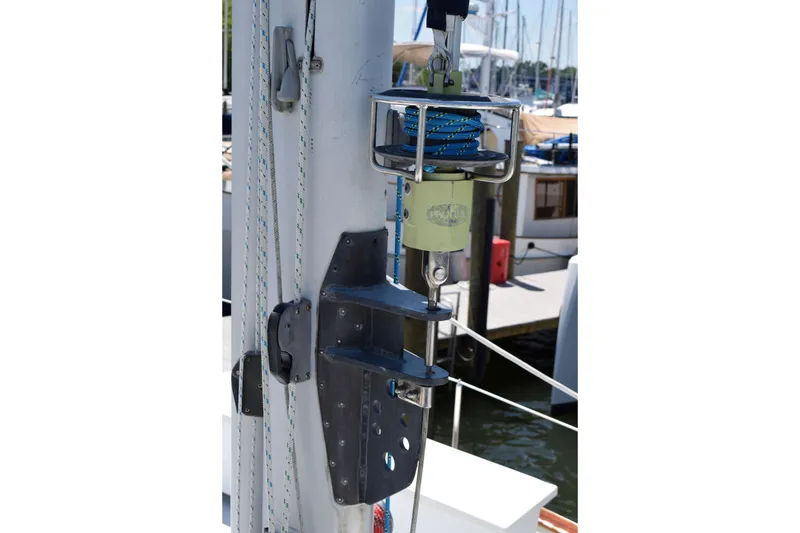 Slide: The Image of Close-up of a 1980 Cheoy Lee 52 Motorsailer mast with rigging details. - 30