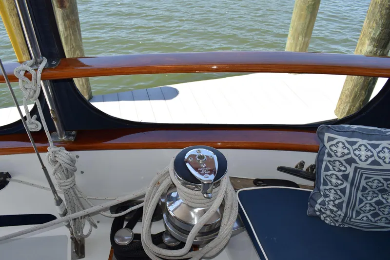 Slide: The Image of Deck view of 1980 Cheoy Lee 52 Motorsailer with ropes and nautical decor. - 37