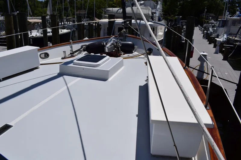 Slide: The Image of 1980 Cheoy Lee 52 Motorsailer deck view at marina. - 24