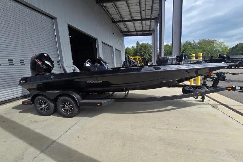 The Image of 2027 iKon VLX21 boat on trailer outside a warehouse. - 0