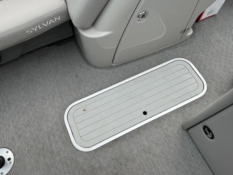 Slide: The Image of Gray carpeted floor on a 2021 Sylvan L3PF TRITOON with a recessed hatch. - 11