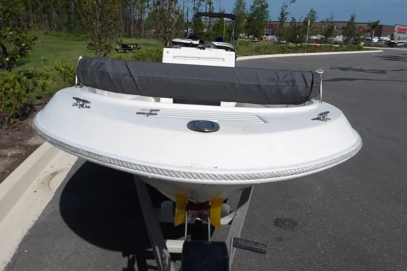 Slide: The Image of 2002 Wellcraft 160 Fisherman boat on trailer, parked outdoors. - 9