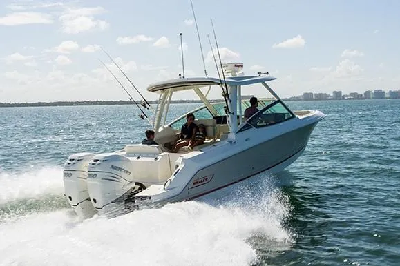 Slide: The Image of Manufacturer Provided Image: 2026 Boston Whaler 280 Vantage cruising on open water with passengers onboard. - 3