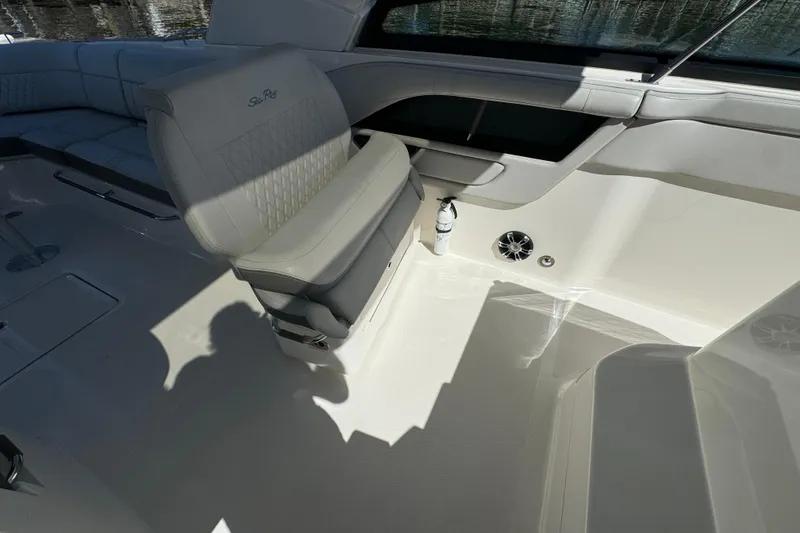 Slide: The Image of 2022 Sea Ray SLX 400 Outboard interior with luxurious seating and modern design. - 10
