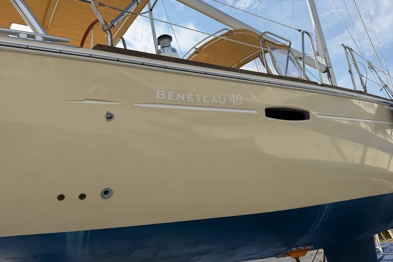The Image of 2010 Beneteau Oceanis 40 sailboat with beige hull and blue bottom. - 0