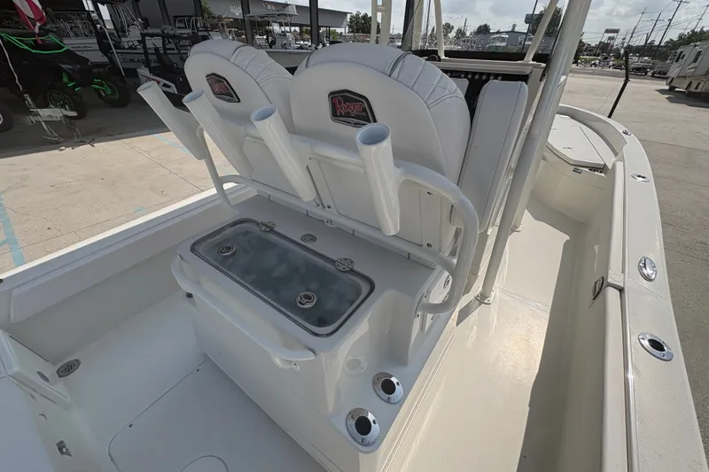 Slide: The Image of 2022 Ranger 2510 Bay boat interior with seating and rod holders. - 21